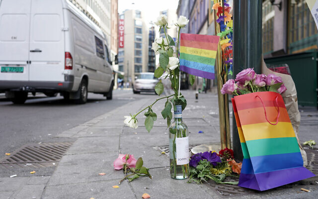 Flowers are left at the scene of a shooting in central Oslo, June 25, 2022. (Hakon Mosvold Larsen/NTB Scanpix via AP) Flowers are left at the scene of a shooting in central Oslo, June 25, 2022. (Hakon Mosvold Larsen/NTB Scanpix via AP)