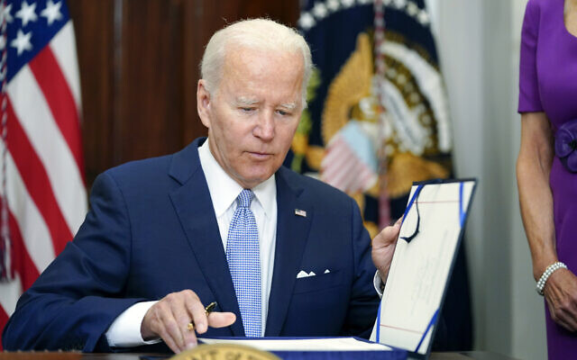 US President Joe Biden signs into law S. 2938, the Bipartisan Safer Communities Act gun safety bill, in the Roosevelt Room of the White House in Washington, June 25, 2022. (AP Photo/Pablo Martinez Monsivais) US President Joe Biden signs into law S. 2938, the Bipartisan Safer Communities Act gun safety bill, in the Roosevelt Room of the White House in Washington, June 25, 2022. (AP Photo/Pablo Martinez Monsivais)