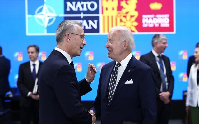 NATO Secretary General Jens Stoltenberg, left, speaks with US President Joe Biden during a round table meeting at a NATO summit in Madrid, Spain on June 30, 2022. (AP Photo/Bernat Armangue) NATO Secretary General Jens Stoltenberg, left, speaks with US President Joe Biden during a round table meeting at a NATO summit in Madrid, Spain on June 30, 2022. (AP Photo/Bernat Armangue)