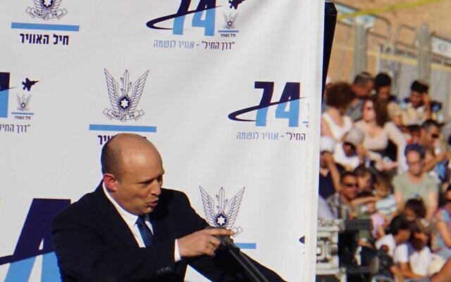 Prime Minister Naftali Bennett speaks at the IAF pilots course graduation ceremony on June 23, 2022. (Emanuel Fabian/Times of Israel) Prime Minister Naftali Bennett speaks at the IAF pilots course graduation ceremony on June 23, 2022. (Emanuel Fabian/Times of Israel)