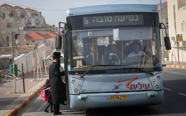 Illustrative: An Ultra orthodox Jewish man boards a bus at Beitar Illit settlement. January 17, 2017. (Nati Shohat/FLASH90) Illustrative: An Ultra orthodox Jewish man boards a bus at Beitar Illit settlement. January 17, 2017. (Nati Shohat/FLASH90)