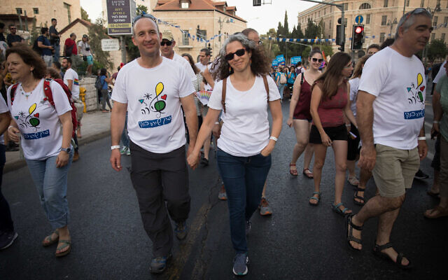 File: Miriam and Ori Banki, parents of Shira Banki, who was murdered at the 2015 Jerusalem Gay Pride parade, taking part in the annual Pride Parade in Jerusalem, June 6, 2019. (Noam Revkin Fenton/Flash90) File: Miriam and Ori Banki, parents of Shira Banki, who was murdered at the 2015 Jerusalem Gay Pride parade, taking part in the annual Pride Parade in Jerusalem, June 6, 2019. (Noam Revkin Fenton/Flash90)