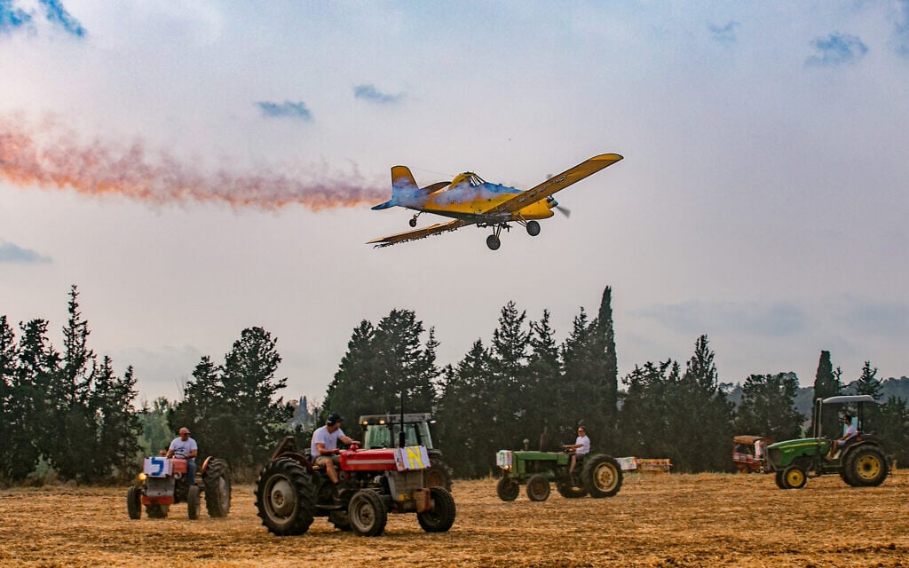 Israelis seen at a celebration for the Jewish holiday of Shavuot in Kibbutz Sarid, in Emek Yizrael on June 8, 2019. (Anat Hermony/Flash90)
