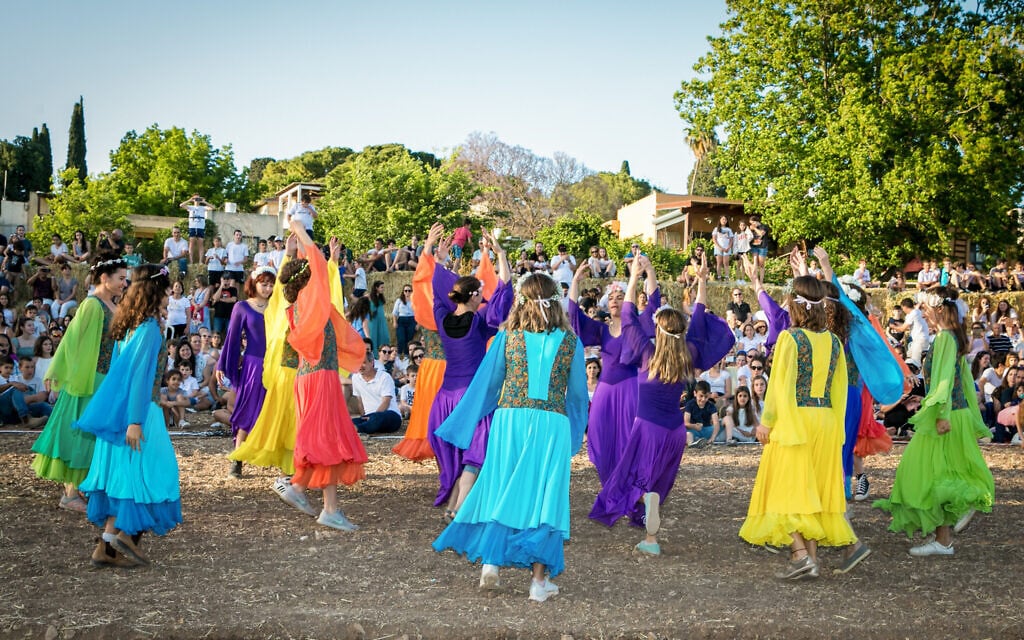 Israelis seen at a celebration for the Jewish holiday of Shavuot in Kibbutz Sarid, in Emek Yizrael on May 16, 2021. (Anat Hermony/Flash90)