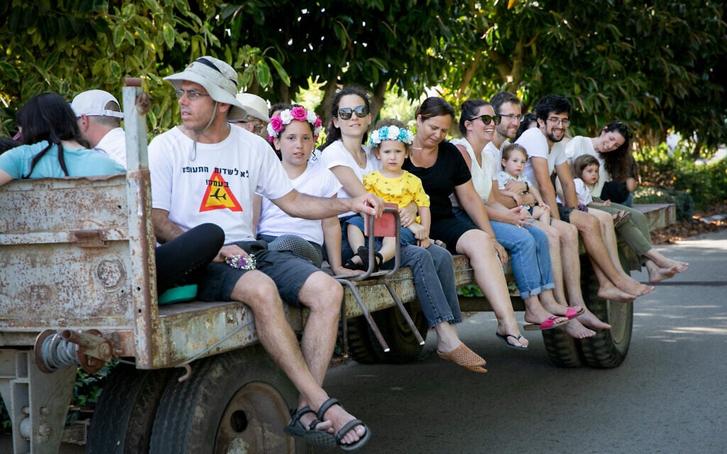 Israelis seen at a celebration for the Jewish holiday of Shavuot in Kibbutz Sarid, in Emek Yizrael on May 16, 2021. (Anat Hermony/Flash90)