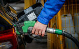 Illustrative image of a car being refueled at a gas station, in Jerusalem, on March 11, 2022. (Jamal Awad/Flash90)