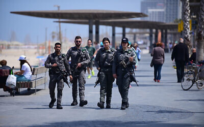 Police patrol on the beach in Tel Aviv, May 1, 2022. (Tomer Neuberg/Flash90) Police patrol on the beach in Tel Aviv, May 1, 2022. (Tomer Neuberg/Flash90)