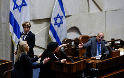 MK Orit Strook, center left, argues with Deputy Knesset Speaker MK Ahmed Tibi, right, in the Knesset in Jerusalem on June 1, 2022. (Olivier Fitoussi/Flash90)