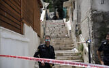 Police at the scene where a man  murdered his wife and then tried to kill himself on June 12, 2022, in Haifa (Shir Torem/Flash90)