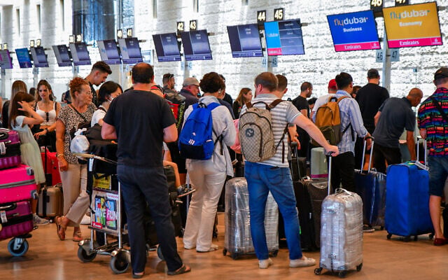 Travelers at Ben Gurion International Airport, on June 14, 2022. (Avshalom Sassoni/Flash90) Travelers at Ben Gurion International Airport, on June 14, 2022. (Avshalom Sassoni/Flash90)