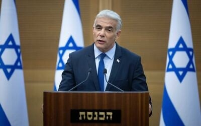 Prime Minister Yair Lapid at a press conference at the Knesset on June 20, 2022. (Yonatan Sindel/Flash90)