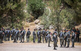Israeli security forces and volunteers search for Moshe Klinerman, a 16-year-old who has been missing for three months in the Meron area, near Safed, June 22, 2022. (David Cohen/Flash90)