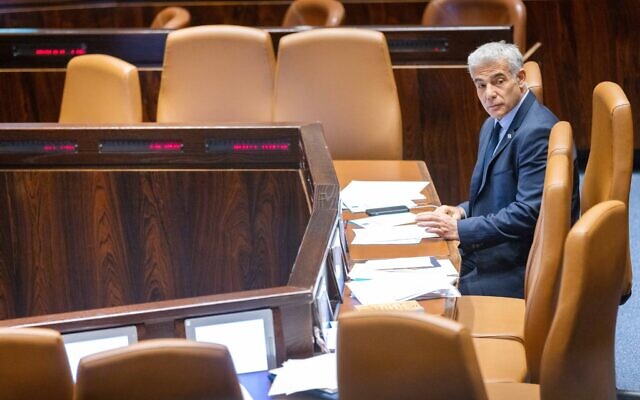 Minister of Foreign Affairs Yair Lapid during a discussion and a vote on a bill to dissolve the Knesset, on June 27, 2022. (Olivier Fitoussi/Flash90) Minister of Foreign Affairs Yair Lapid during a discussion and a vote on a bill to dissolve the Knesset, on June 27, 2022. (Olivier Fitoussi/Flash90)