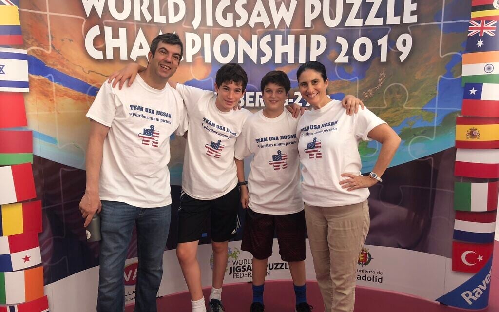 A.J. Jacobs with wife and sons at the 2019 World Jigsaw Puzzle Championship in Spain. (Courtesy)