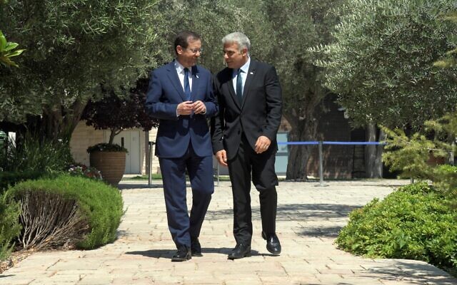 President Isaac Herzog meets with then-incoming prime minister Yair Lapid, at the President's Residence in Jerusalem, June 30, 2022. (Haim Zach/GPO) President Isaac Herzog meets with then-incoming prime minister Yair Lapid, at the President's Residence in Jerusalem, June 30, 2022. (Haim Zach/GPO)