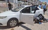 The car in which a man was shot dead in Shoham, June 14, 2022. (Israel Police)
