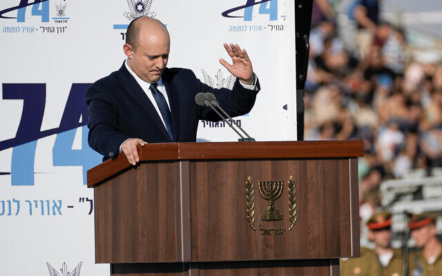 Prime Minister Naftali Bennett attends a graduation ceremony for new pilots at Hatzerim air force base near the southern city of Beersheba, June 23, 2022. (AP/Tsafrir Abayov) Prime Minister Naftali Bennett attends a graduation ceremony for new pilots at Hatzerim air force base near the southern city of Beersheba, June 23, 2022. (AP/Tsafrir Abayov)