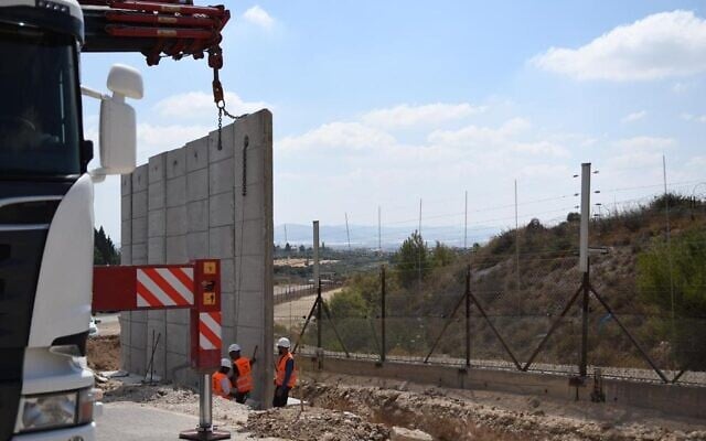 Construction work begins to upgrade a section of the West Bank security barrier, June 21, 2022. (Defense Ministry) Construction work begins to upgrade a section of the West Bank security barrier, June 21, 2022. (Defense Ministry)