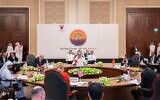 Bahrain’s Undersecretary for International Affairs Sheikh Abdullah bin Ahmed Al Khalifa (Center) leads a meeting of the Negev Forum Steering Committee in Manama, Bahrain, June 27, 2022 (Bahrain Foreign Ministry)