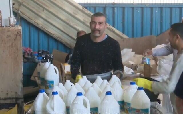 Screen capture from video of workers at the Yahalom cleaning product factory. (Channel 12 News) Screen capture from video of workers at the Yahalom cleaning product factory. (Channel 12 News)