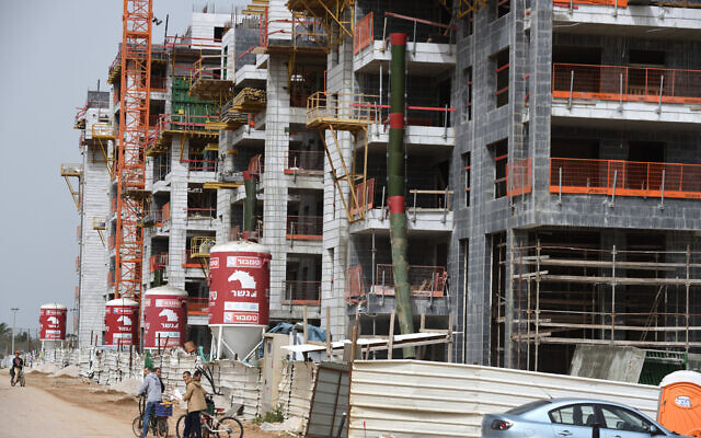 A construction site of a new residential neighborhood in Herzliya, on March 27,2020. (Gili Yaari / Flash90) A construction site of a new residential neighborhood in Herzliya, on March 27,2020. (Gili Yaari / Flash90)
