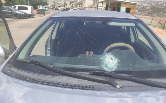 A car that was damaged by rock throwers near the West Bank settlement of Ofra on June 12, 2022. (Rescuers Without Borders) A car that was damaged by rock throwers near the West Bank settlement of Ofra on June 12, 2022. (Rescuers Without Borders)