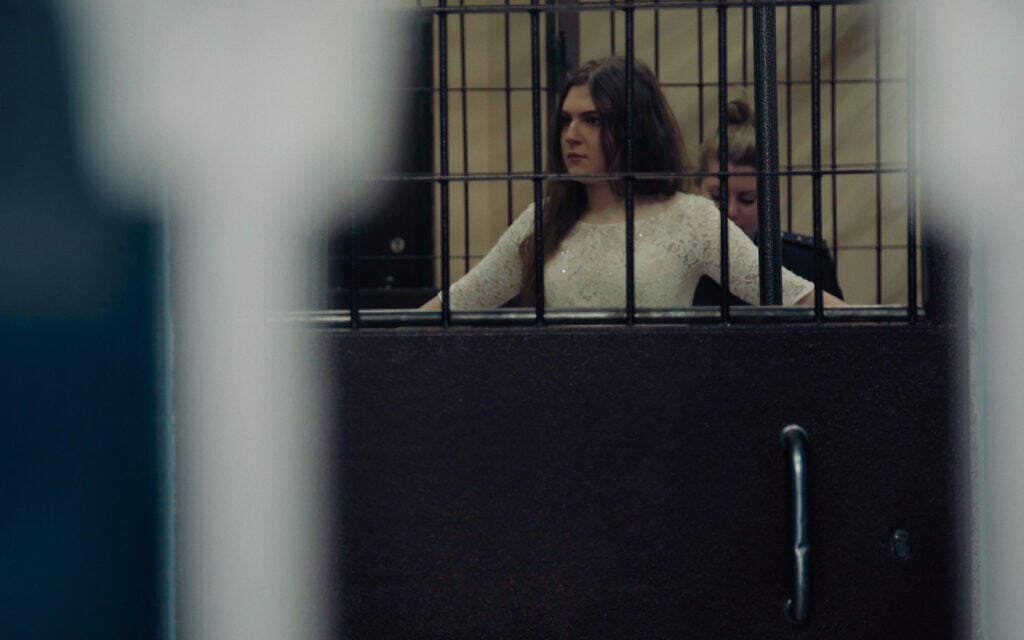 Anna (Anya) Pavlikova wears a wedding dress as she gets permission to leave house arrest to wed imprisoned human rights activist Kostya Kotov. (IV Films/The New Greatness Case