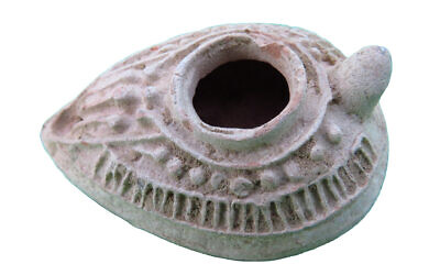 A ceramic artifact discovered in the site of the early mosque in Rahat, dated to the Early Islamic period. (Yasmin Orbach, Israel Antiquities Authority)