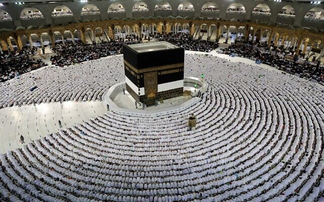Muslim worshippers pray around the Kaaba at the Grand Mosque in Saudi Arabia's holy city of Mecca on July 5, 2022 (AFP) Muslim worshippers pray around the Kaaba at the Grand Mosque in Saudi Arabia's holy city of Mecca on July 5, 2022 (AFP)