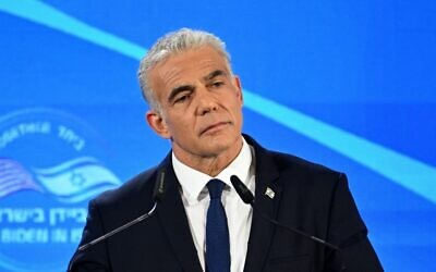 Prime Minister Yair Lapid speaks during a joint press conference with US President Joe Biden, in Jerusalem on July 14, 2022. (MANDEL NGAN / AFP)