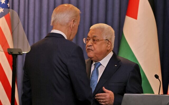 US President Joe Biden (left) and Palestinian Authority President Mahmoud Abbas speak after their statements to the media at the Muqataa Presidential Compound in the city of Bethlehem in the West Bank on July 15, 2022. (AHMAD GHARABLI / AFP)
