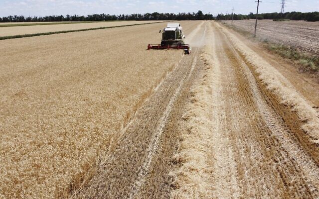 An aerial picture taken on July 21, 2022 shows a combine harvester in a wheat field near Mykolaiv, amid the Russian invasion of Ukraine. (Ionut Iordachescu / AFP) An aerial picture taken on July 21, 2022 shows a combine harvester in a wheat field near Mykolaiv, amid the Russian invasion of Ukraine. (Ionut Iordachescu / AFP)