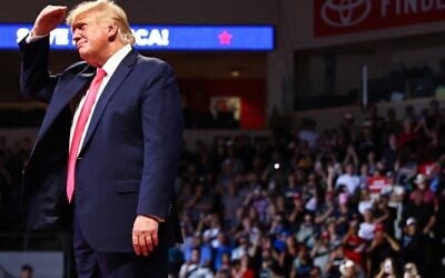 Former US president Donald Trump looks towards the crowd as he enters a 'Save America' rally in support of Arizona GOP candidates on July 22, 2022 in Prescott Valley, Arizona. (Mario Tama/Getty Images/AFP)