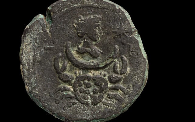 An 1,850-year-old coin bearing the image of Luna, the goddess of the moon. found off the Carmel Coast. (Dafna Gazit, Israel Antiquities Authority)