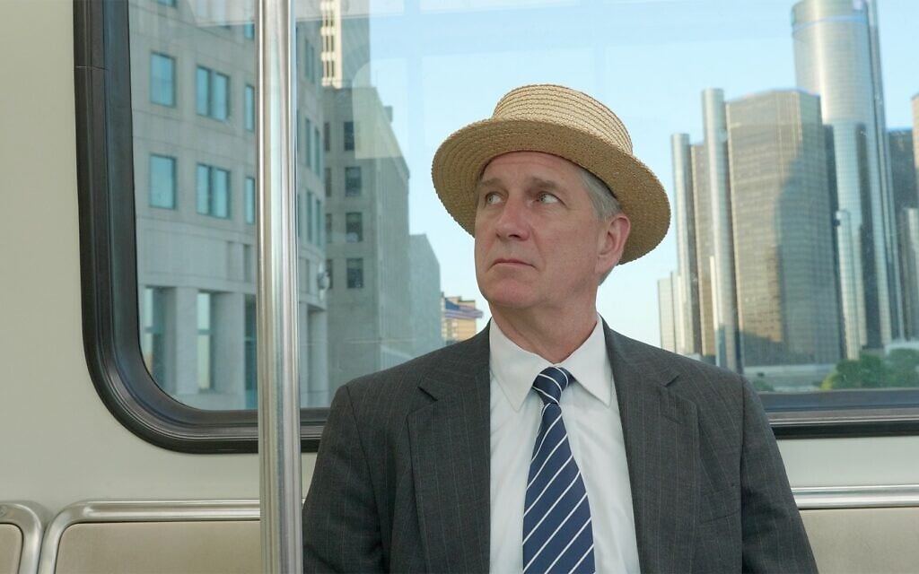 The ghost of Henry Ford, played by John Lepard, kills time on Detroit’s People Mover in '10 Questions for Henry Ford.' (Andy Kirshner)