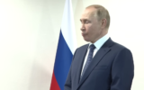 Russia's President Vladamir Putin is made to wait by his Turkish counterpart President Recep Tayyip Erdogan before a one-on-one meeting in Tehran, July 19, 2022. (Screengrab/YouTube)