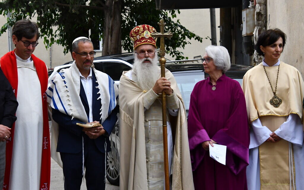 Clergy from the Peace Cathedral and its inspirations, including the House of One in Berlin, seen outside the complex in Tbilisi. (Nano Saralishvili/ via JTA)