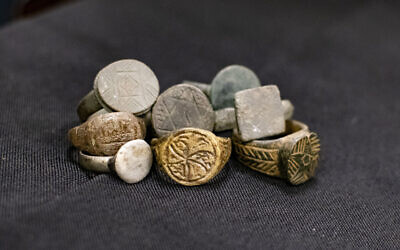Ancient rings seized during the search of a home in Afula, July 7, 2022. (Yoli Schwartz/IAA)