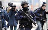 Illustrative: A special force police officer patrols near the department store Ahlens following a suspected terror attack on the Drottninggatan street in central Stockholm, Sweden, April 8, 2017. (AP Photo/Markus Schreiber)