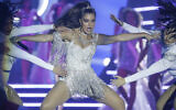 Noa Kirel performs during the 70th Miss Universe pageant in Eilat, December 13, 2021. (AP Photo/Ariel Schalit/File)