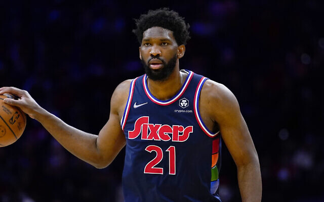 Philadelphia 76ers' Joel Embiid plays during an NBA basketball game, Friday, Jan. 21, 2022, in Philadelphia. (AP/Matt Slocum) Philadelphia 76ers' Joel Embiid plays during an NBA basketball game, Friday, Jan. 21, 2022, in Philadelphia. (AP/Matt Slocum)