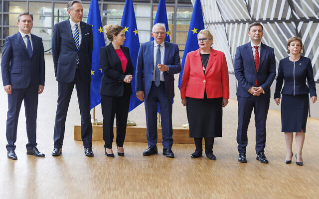 Illuistrative: From left, Serbian foreign minister Nikola Selakovic, Foreign Affairs Minister of Montenegro Ranko Krivokapic, Albanian Minister of Europe and Foreign Affairs Olta Xhacka, EU Foreign Policy Chief Josep Borrell, Foreign Minister of Bosnia and Herzegovina Bisera Turkovic, Macedonia's Foreign Minister Bujar Osmani and Foreign Affairs Minister of Kosovo Donika Gervalla pose for the Western Balkans family picture after a meeting of EU foreign ministers at the European Council building in Brussels, Monday, May 16, 2022. (AP Photo/Olivier Matthys) Illuistrative: From left, Serbian foreign minister Nikola Selakovic, Foreign Affairs Minister of Montenegro Ranko Krivokapic, Albanian Minister of Europe and Foreign Affairs Olta Xhacka, EU Foreign Policy Chief Josep Borrell, Foreign Minister of Bosnia and Herzegovina Bisera Turkovic, Macedonia's Foreign Minister Bujar Osmani and Foreign Affairs Minister of Kosovo Donika Gervalla pose for the Western Balkans family picture after a meeting of EU foreign ministers at the European Council building in Brussels, Monday, May 16, 2022. (AP Photo/Olivier Matthys)