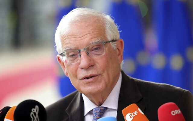 European Union foreign policy chief Josep Borrell speaks with the media as he arrives for an EU summit in Brussels, on June 23, 2022. (AP Photo/Olivier Matthys)