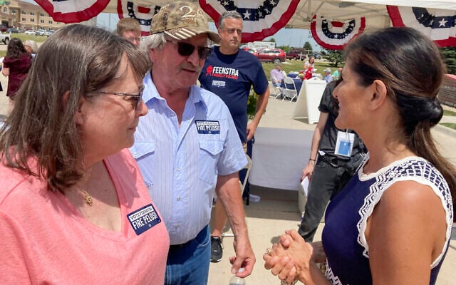 Former US ambassador to the UN Nikki Haley talks with Bob and Kathy de Koning, a farming couple from Sioux County, Iowa, June 30, 2022, after headlining a fundraiser in northwest Iowa for Republican Representative Randy Feenstra. (AP Photo/Tom Beaumont) Former US ambassador to the UN Nikki Haley talks with Bob and Kathy de Koning, a farming couple from Sioux County, Iowa, June 30, 2022, after headlining a fundraiser in northwest Iowa for Republican Representative Randy Feenstra. (AP Photo/Tom Beaumont)