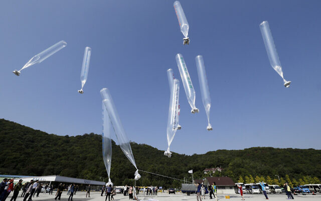 North Korean defectors release balloons carrying leaflets condemning North Korean leader Kim Jong Un and his government's policies, in Paju, South Korea, near the border with North Korea, October 10, 2014. (AP/Ahn Young-joon, File) North Korean defectors release balloons carrying leaflets condemning North Korean leader Kim Jong Un and his government's policies, in Paju, South Korea, near the border with North Korea, October 10, 2014. (AP/Ahn Young-joon, File)