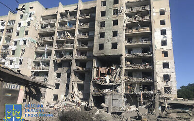In this photo provided by the Odesa Regional Prosecutor's Office, a damaged residential building is seen in Odesa, Ukraine, early Friday, July 1, 2022, following Russian missile attacks. (Ukrainian Emergency Service via AP)