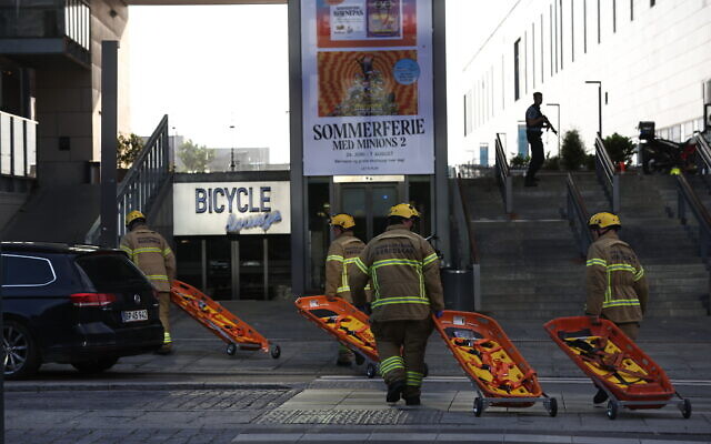 Emergency services personnel work at the Field's shopping center after a fatal shooting attack in Copenhagen, Denmark, Sunday July 3, 2022. (Olafur Steinar Gestsson/Ritzau Scanpix via AP) Emergency services personnel work at the Field's shopping center after a fatal shooting attack in Copenhagen, Denmark, Sunday July 3, 2022. (Olafur Steinar Gestsson/Ritzau Scanpix via AP)