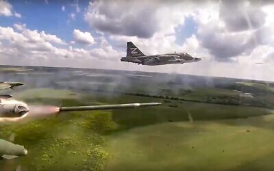 In this handout photo released by Russian Defense Ministry Press Service on, July 2, 2022, a Russian Su-25 ground attack jet fires rockets on a mission at an undisclosed location in Ukraine. (Russian Defense Ministry Press Service via AP, File)