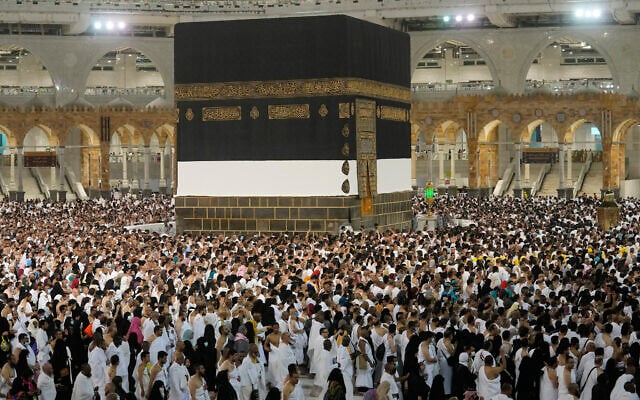 Muslim pilgrims circumambulate around the Kaaba, the cubic building at the Grand Mosque, in Mecca, Saudi Arabia, July 6, 2022. (Amr Nabil/AP) Muslim pilgrims circumambulate around the Kaaba, the cubic building at the Grand Mosque, in Mecca, Saudi Arabia, July 6, 2022. (Amr Nabil/AP)