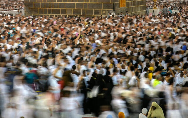 In this photo taken with low shutter speed, Muslim pilgrims circumambulate around the Kaaba, the cubic building at the Grand Mosque, in Mecca, Saudi Arabia, July 6, 2022. (Amr Nabil/AP) In this photo taken with low shutter speed, Muslim pilgrims circumambulate around the Kaaba, the cubic building at the Grand Mosque, in Mecca, Saudi Arabia, July 6, 2022. (Amr Nabil/AP)